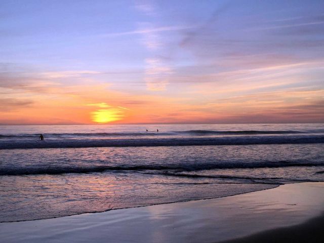 Goleta surfing at sunset. Credit: Brian Wolf